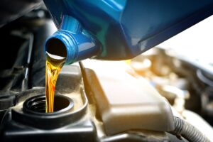 Refueling,And,Pouring,Oil,Quality,Into,The,Engine,Motor,Car
