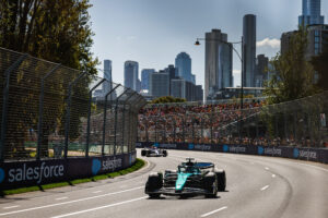 Lance Stroll, Aston Martin AMR24, leads Yuki Tsunoda, VCARB 01